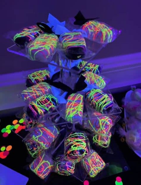 Easy Black Light Party Ideas in 2023 | Parties Made Personal Black Light Decorations, Light Party Ideas, Black Light Party Ideas, Neon Party Foods, Glow Party Food, Neon Pool Parties, Black Light Party, Glow In Dark Party, Neon Birthday Party