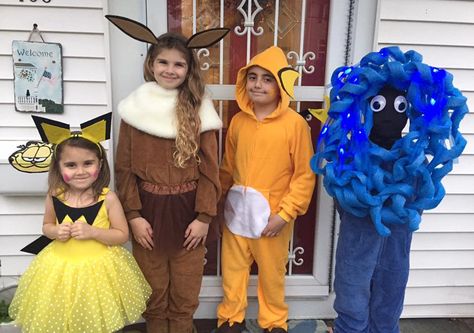 Pichu, Eevee, Raichu, and Tangela Pokemon costumes Easy Pokemon Costumes, Eeveelutions Costumes, Toddler Eevee Costume, Homemade Pokemon Costumes, Eevee Dog Costume, Pokemon Costumes Kids, Tangela Pokemon, Pokémon Costume, Pokemon Mascot Costume