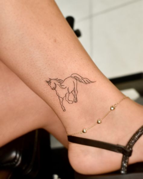 🐎 ❤️ . #tattoo #tatuagem #tatuaje #horse #tattoohorse #fineline #finelinetattoo Fine Line Horse Tattoo Ideas, Wild Horses Tattoo, Fine Line Horse Tattoo, Carousel Tattoo, Small Horse Tattoo, Horse Tattoos, Ankle Bracelet Tattoo, Bracelet Tattoo, Tattoo Bracelet