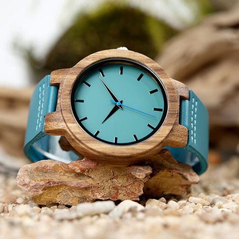 Wooden watches UK has grown in popularity over recent years. They come in a variety of different styles. These wooden watches can be very decorative. Some can be very elegant and make a strong fashion statement. There are also simple watches that convey a simpler message to the people who see it. This type of watch will probably not be very financially active, but it will convey a great deal of style to those who wear it. This Is Water, Wooden Watches, Simple Watches, Water Resistant Watch, Dapper Men, Zebra Wood, Wooden Watch, Casual Watches, Leather Watch Bands