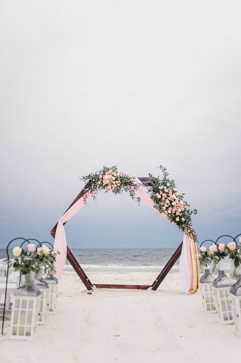 Pink White Gold Wooden Hexagon Arch with Flowers for Gulf Shores, Alabama Beach Wedding Beach Wedding Arbors, Hexagon Wedding Arch, August Wedding Colors, Weddings At The Beach, Hexagon Arch, Royal Blue Wedding Theme, Wooden Wedding Arches, Hexagon Wedding, Wedding Arbors