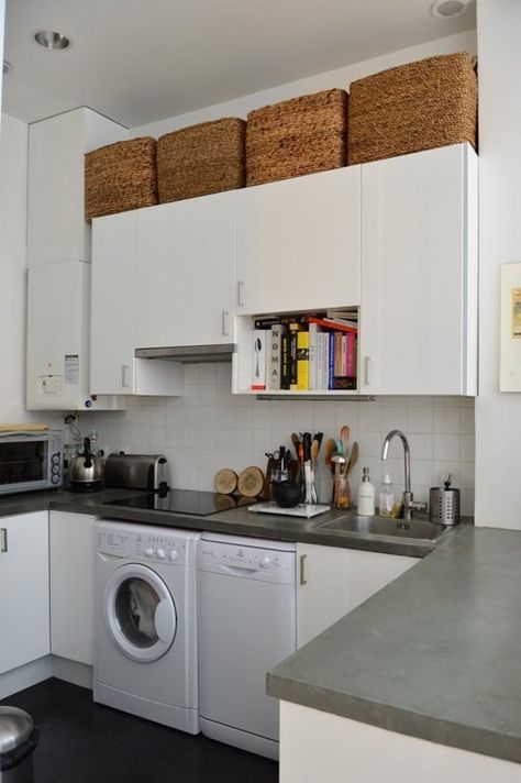 Wicker baskets can work, too. | 17 Ways To Squeeze A Little Extra Storage Out Of A Tiny Kitchen Above Cabinet Storage, Storage Above Kitchen Cabinets, Dishwasher Liquid, Top Of Kitchen Cabinets, Small Space Inspiration, Top Of Cabinets, Tiny Kitchen Design, Paris Kitchen, Above Kitchen Cabinets