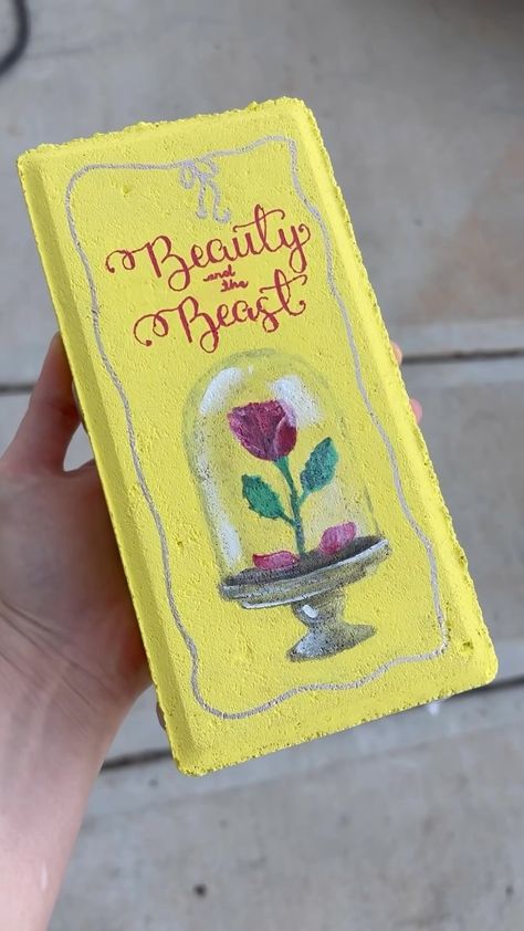 Melani Alberts | Should i add more brick paver books to my garden library? This time we had Beauty and the Beast. Bricks: @homedepot markers:… | Instagram Beauty And The Beast Crafts, Painted Bricks Crafts, Brick Crafts, Garden Library, Serenity Garden, Brick Art, Brick Pavers, Garden Painting, Painted Brick