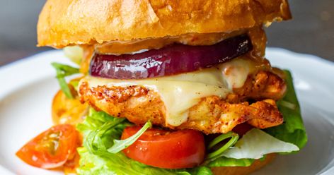 Tandoori Chicken Burgers with Spicy Mayo Tandoori Paste, Fakeaway Recipes, Red Onion Salad, Chicken Burger, Spicy Mayo, Shredded Lettuce, Burger Buns, Sliced Tomato, Chilli Sauce