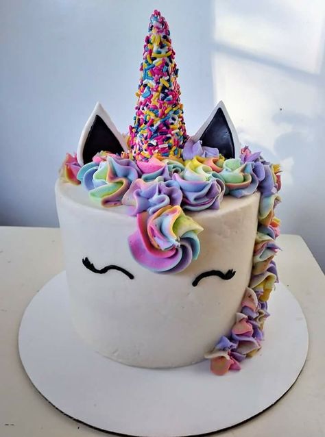 Colorful swirled unicorn cake with a sprinkled horn Diy Unicorn Cake, Easy Unicorn Cake, Unicorn Birthday Party Cake, Unicorn Cake Smash, Unicorn Cake Pops, Pear And Almond Cake, Savory Cakes, Unicorn Birthday Cake, Unicorn Cake Topper