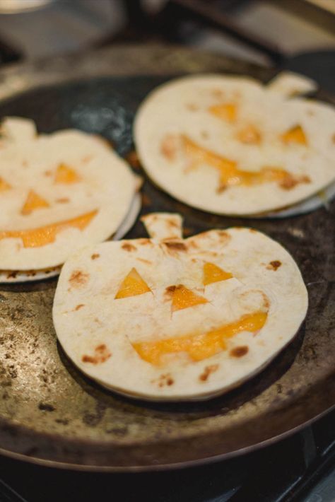 Pumpkin Quesadillas

Delicious idea for children on Halloween

Ingredients
Ham
cheedar cheese
flour tortilla

Instructions
Take two tortillas and with a knife, cut at the top to shape a pumpkin, cut 2 triangles for the eyes, one for the nose and mouth, place the ham and cheese on a tortilla and cover with the tortilla that has the face shape, heat on a pan and serve when the cheese melts.
*Receta en español en el video de Yutube Halloween Shaped Tortilla Chips, Halloween Food Ideas Sandwiches, Halloween Party Sandwiches, Halloween Empanadas, Pumpkin Tortillas, Halloween Quesadilla, Halloween Tortilla, Halloween Finger Foods, Recetas Halloween