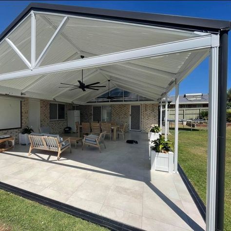 Check out this amazing before and after shot of a DIY Stratco Outback® Clearspan Gable Roof Patio. One of our Queensland patio experts helped design a 3D version for the customer and supported them throughout their DIY Patio project. Get a free quote on your next Stratco home improvement project here bit.ly/stratco-quote Pin to your patio inspiration board 📌 #stratco #australia #howto #patio #outbackdealer #outdoorliving #patiogoals #patioideas #landscaping #patiostyle #outbackgable Stratco Patio, Gable Pergola, Gable Roof Patio, Pergola Extension, Gable Patio, Extension Roof, Roof Patio, Backyard Retaining Walls, Deck Landscaping