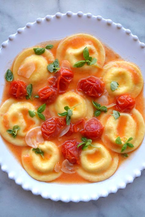 A delicious caprese ravioli filled with whipped ricotta & lemon zest, tossed in a burst cherry tomato sauce with micro basil Caprese Ravioli, Burst Cherry Tomato Sauce, Stuffed Pasta Recipes, Pasta Table, Burst Cherry Tomatoes, Madeira Sauce, Braised Oxtail, Ravioli Filling, Easy Weeknight Recipes