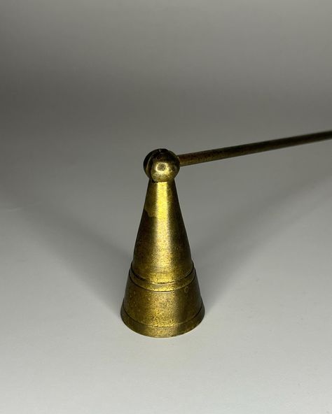 🕸️vintage pivoting brass cone shaped candle snuffer 🕸️in great vintage condition; original patina. can be polished upon request. sticker says made in india 🕸️12in long x 2.5in tall 🕸️link in bio to purchase • • • • #vintage #brassobsession #antique #antiquestore #smallbusiness #supportsmallbusinesses #homedecor #forsale #arizona #phoenix #etsy #glass #vase #collectables Shaped Candle, Candle Snuffer, Candle Shapes, Antique Stores, Phoenix, Glass Vase, Link In Bio, Patina, Arizona