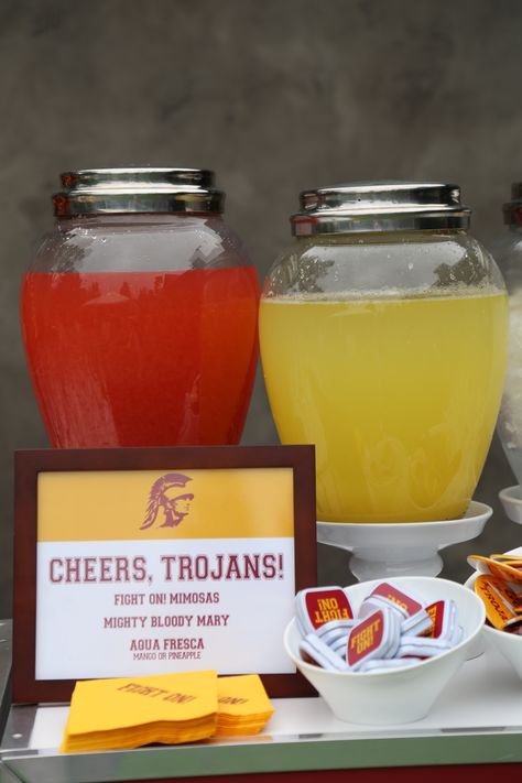 Drinks fit for a USC Trojan! Breakfast cocktails plus these aqua frescas in team colors. Fight on! Usc Party Decorations, Red And Yellow Graduation Party Ideas, Usc Grad Party, Usc Party Ideas, Usc Graduation Party Ideas, Usc Graduation Party, Buccees Birthday Party, Doctorate Party, Aqua Frescas