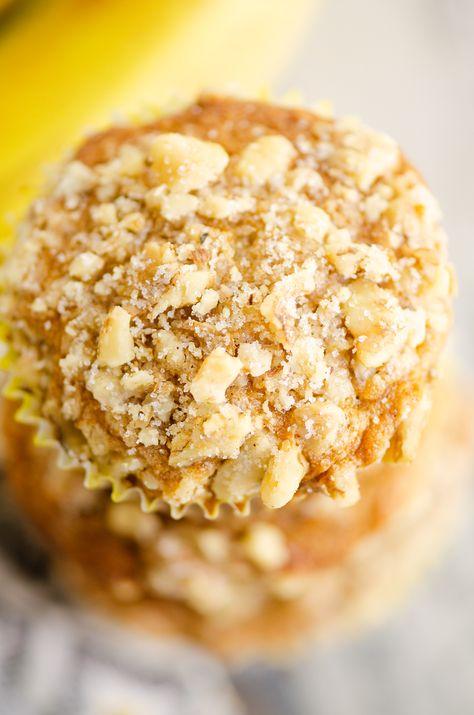 Banana Nut Streusel Muffins are a delicious dessert or breakfast with a moist cake crumb made from a sour cream banana bread recipe. They are topped with cinnamon, sugar and walnuts for a sweet finish. #BananaNutMuffins #BananaBread #BreakfastSweet Sour Cream Banana Bread Recipe, Moist Banana Nut Muffins, Banana Streusel Muffins, Sour Cream Banana Bread, Best Zucchini Bread, Recipes Using Bananas, Banana Nut Muffins, Streusel Muffins, Sour Cream Recipes