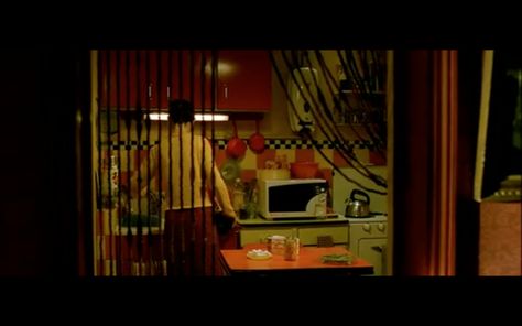 red pots on wall, bead curtain, red cabinets Amelie Apartment, Clue Movie, Red Cabinets, Bead Curtain, Colorful Apartment, Retro Room, Movie Set, Movie Shots, Kitchen Concepts