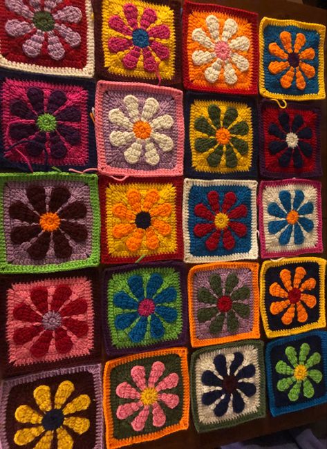 60s style flower crochet squares for a blanket. funky colors all random 70s Crochet Flowers, Hippy Crochet Blanket, Crochet 70s Flower, Crochet Flower Granny Square Cardigan, Vintage Flower Granny Square, Retro Flower Granny Square Pattern, Crochet Retro Flower, Hippie Crochet Blanket, Crochet Flower Blanket Granny Squares