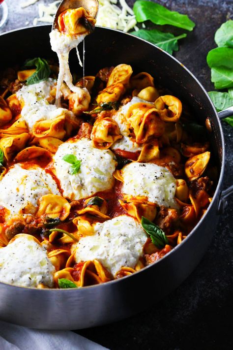 This 20-Minute Tortellini Skillet Lasagna with Sausage & Kale makes it easy to have a delicious and nutritious Italian dinner on the table in a hurry, even on a weeknight. | platingsandpairings.com Skillet Tortellini, Lasagna Skillet, Food Lasagna, Tortellini Skillet, Lasagna Food, Italian Tortellini, Skillet Lasagna Recipe, Kid Friendly Meals Dinner, Chicken Fajita Pasta