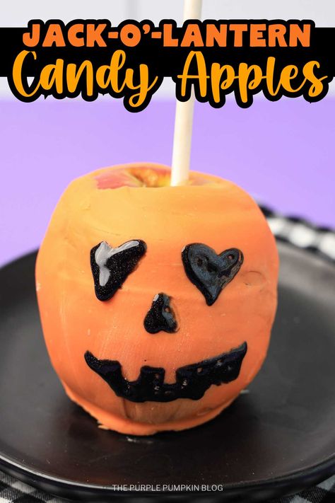 Spice up your Halloween with these festive Jack-o'-Lantern Candy Apples! These candy apples are dipped in vibrant orange candy melts and decorated with fun pumpkin faces using black sparkle gel. Perfect for Halloween parties, trick-or-treaters, or a themed family night, they’re an easy yet impressive dessert to make. Enjoy the sweet combination of crunchy apples and candy coating with this fun Halloween recipe. Visit The Purple Pumpkin Blog for the full recipe instructions. Halloween Candy Apples, Impressive Dessert, Candy Apple Recipe, Spooky Halloween Treats, Fun Halloween Food, Impressive Desserts, Halloween Party Dinner, Purple Pumpkin, Edible Crafts