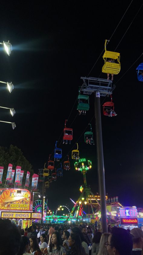 A picture of the crowded NC State Fair. Nc State Fair, State Fair Aesthetic, Nyc In November, Autumn Fair, October Girl, Fall Fair, Girl Vision Board, Outdoor Movie Night, Fair Rides