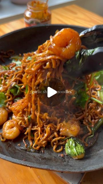 Zainab Pirzada on Instagram: "Spice up your dinner with this garlicky shrimp noodle delight! 🍤✨ 

Ready in 15 minutes, bursting with flavour, and perfect for when you need a quick, delicious meal. 

Ingredients:
2 tbsp vegetable oil
5 spring onions, chopped
1 tbsp garlic, chopped
1 tsp ginger, minced
150g wheat noodles
100g baby spinach or greens of choice
200g raw, peeled and deveined prawns
1 tbsp garlic chilli oil

Sauce:
2 tbsp dark soy sauce
1 tbsp sesame oil 
1 tbsp fish sauce 
1 tsp honey 
1 tsp vinegar 

Start by frying spring onions in vegetable oil for 2 mins, add ginger and garlic and stir for 1 min. 

Add the prawns and once they’re slightly coloured, should take 2 mins, add in the noodles and baby spinach. Toss it together for 1 min. 

In a bowl mix together all the ingredien Garlic Chilli Oil, Garlicky Shrimp, Shrimp Noodles, Dark Soy Sauce, Easy Snacks For Kids, Wheat Noodles, Chilli Oil, Spring Onions, Rice Grain