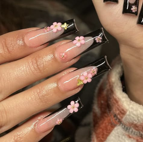 Black Nail Sets With Designs, Black French Tip Nails With Pink Flowers, Black Nail Sets With Flowers, 3d Flower And Butterfly Nails, Black Tip Nails With Flowers, Black With Pink Flowers Nails, Black And Gold Flower Nails, Black French Tip With Pink Flowers, Black French With Flowers