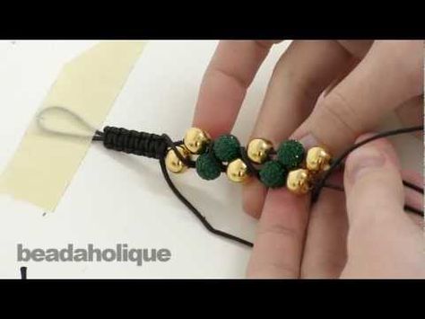 http://www.beadaholique.com/yt - In this video, learn how to make a zig zag double row Shambhala style bracelet using waxed cotton cord, 10mm round beads, and macrame knotting.    Designer: Megan Milliken    How to Make a Shambhala Bracelet, Part I: Macrame Square Knots  http://www.beadaholique.com/t-video-How-To-Make-Macrame-Square-Knots.aspx?utm_so... Double Row Bead Bracelet Diy, Double Beaded Bracelet Diy, Macrame Videos, Macrame Square, Beaded Bracelet Diy, Macrame Square Knot, Shambala Bracelet, Yoga Bracelet Beads, Macrame Bracelet Tutorial