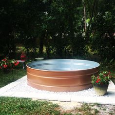 copper painted stock tank pool Tank Pool Ideas, Stock Pool, Stock Tank Pool Ideas, Pool Stairs, Galvanized Stock Tank, Stock Tank Swimming Pool, Tank Swimming Pool, Stock Pools, Tank Pools