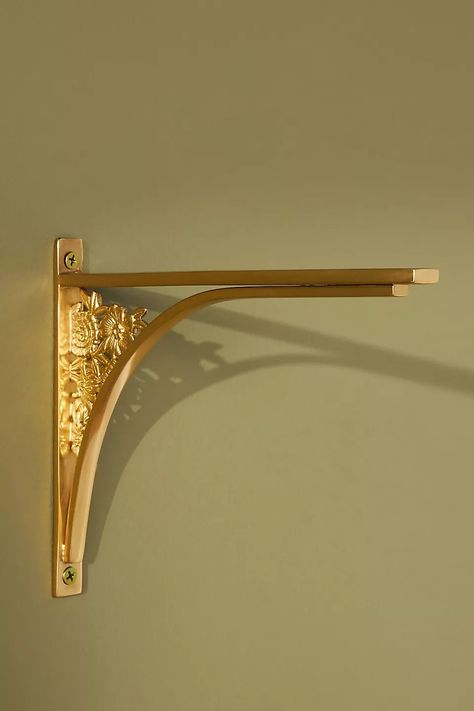 Blume Floral Shelf Bracket | AnthroLiving Shelf With Metal Bracket, Bookshelves With Brackets, Brass Floating Shelf, Cute Shelf Brackets, Brass Brackets For Shelves, Shelf Bracket Ideas, Homeschool Closet, Shelving With Brackets, Shelves Above Desk