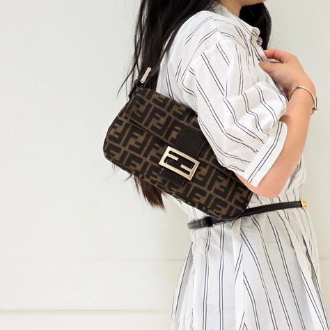 💖 (On Sale Now) 👜Fendi FF Zucca Baguette Shoulder Bag Price: $1299.87 CAD Condition: 9.5/10 Includes: - Entrupy Authenticity Certificate ✅ Authenticity Guaranteed or Full Refund 📦 Free Shipping to Canada & US with Signature (insurance not included) 📷 If you need more detailed photos, don't hesitate to DM us. 📷 Disclaimer: Forgotten Luxuries is not associated or affiliated with any of the brands featured. All copyrights and trademarks are owned by their respective brand holders. Forgott... Fendi Big Bags, Fendi Zucca Bag, Fendi Tote Black, Fendi Shoulder Bag Vintage, Fendi Tote Bag Fur, Interior Clean, Monogram Prints, Canvas Shoulder Bag, Leather Straps