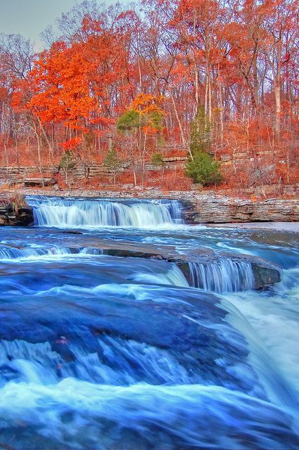 The largest waterfall in the state of Indiana can be found inside Cataract State Park. Cataract Falls drops for a total of 86 feet, with the upper falls making up 20 feet of this figure. The hike to the falls is of moderate difficulty and less than three miles in length, with the best time to visit between December and May. As Cataract Falls is made up a long series of cascades, many of the trails within Cataract State Park are within site of the beautiful falling water. Beautiful Crazy, Road Trip Places, Indiana Travel, Largest Waterfall, Beauty Places, Beautiful Places On Earth, Beautiful Places Nature, Beautiful Waterfalls, Beautiful Places To Visit