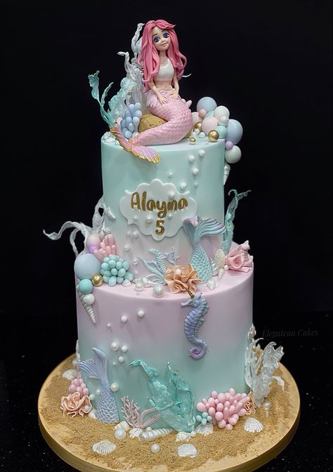 Under The Sea Cake with mermaids Pastel Under The Sea Cake, 3 Tier Mermaid Cake, Mermaid Cake Two Tier, Mermaid Pastel Cake, Mermaid Layer Cake, Mermaid Two Tier Cake, Under The Sea Wedding Cake, Under The Sea Mermaid Cake, Birthday Cake Under The Sea