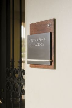 A custom suite plaque with wood, metal and stone. Name Plates For Home Modern, Ada Signage, Entrance Signage, Hotel Signage, Room Signage, Wood Signage, Door Signage, Wayfinding Signage Design, Name Plates For Home