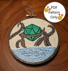 https://encrypted-tbn0.gstatic.com/images?q=tbn:ANd9GcSHE1p6dNtDO9rpFBieoFoxam4amjBMfYiL4g&usqp=CAU D20 Embroidery, Dnd Embroidery, Dice Embroidery, Camp Aesthetic, Dungeon Master Gifts, Digital Embroidery Patterns, D20 Dice, Purple Candy, Camp Camp