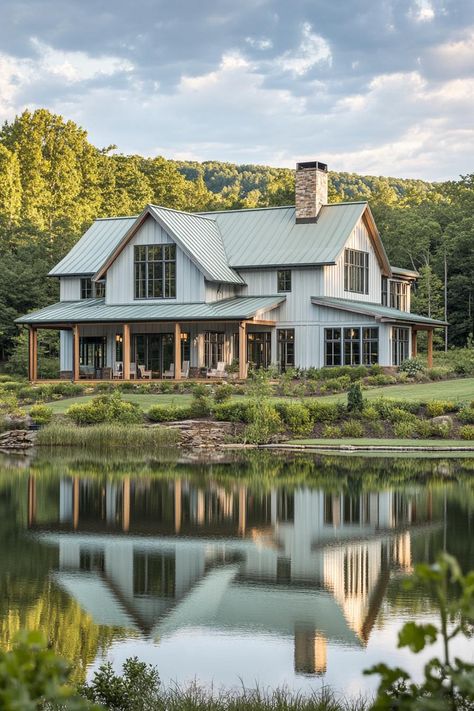 Wide view of a large modern farmhouse in light grey board and batten siding cedar framed windows multi pitched pale green roof brick chimney large. Check out all of these dream farmhouses that will have you drooling with rural living fantasies and mooing with joy!