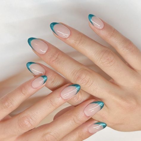 French mani, but make it ✨festive✨ with a pop of holiday color! @glossy.studios used #PutItInNeutral and #TealingFestive. 💅 #FrenchManicure #HolidayNails #NailInspo #NailTech #FrenchMani #FrenchTips Nails For Turquoise Dress, Prom Nails Turquoise, Teal Nail Tips, Teal Chrome French Tip Nails, Teal Tips Nails, Nails For Teal Dress, Torquise Nails French Tip, Teal French Tip Nails Turquoise, Prom Nails Teal