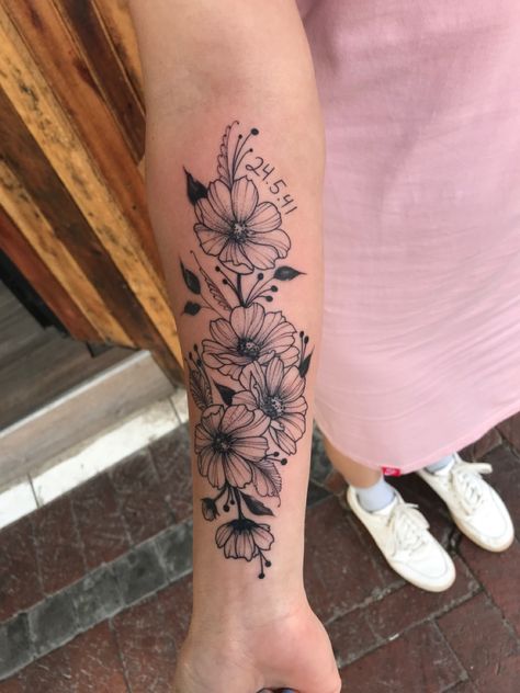 Flowers And Date Tattoo, Flower Tattoos With Dates, Wrist Floral Tattoo, Black And White Floral Tattoo, Gps Coordinates Tattoo, Coordinates Tattoo, Date Tattoos, Hidden Images, Wrist Tattoos