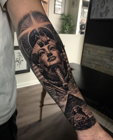 King Tut and Sphinx forearm tattoo King Tut Tattoo, Egypt Tattoo Design, Nefertiti Tattoo, Pyramid Tattoo, Half Sleeve Tattoo Stencils, Half Sleeve Tattoos Forearm, Egyptian Tattoo Sleeve, Anubis Tattoo, Lion Tattoo Sleeves