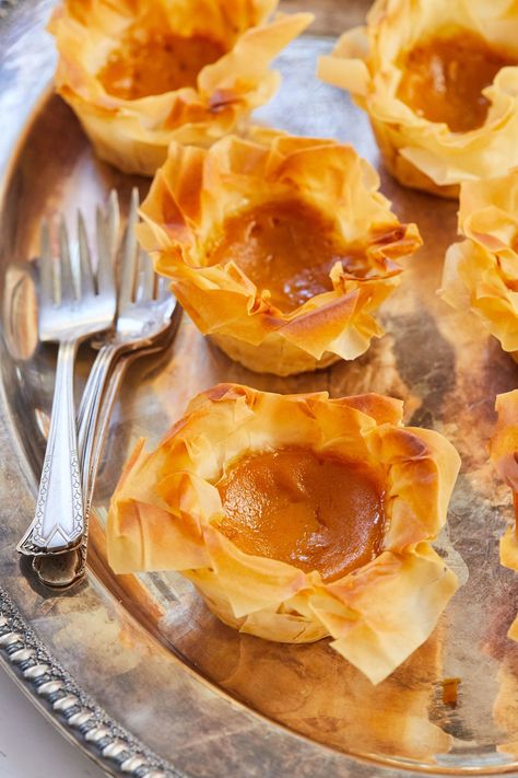 I know there are forks in this picture, but who needs one with these petite pumpkin pies? Individual Pumpkin Pie, Mini Pumpkin Pies Recipe, Crazy Dough, Mini Pumpkin Pie, Individual Pies, Bigger Bolder Baking, Mini Pumpkin Pies, Pumpkin Pies, Phyllo Dough