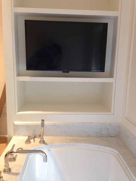 Bathroom TV mounted above bathtub. Tv By Bathtub, Bathtub Tv Ideas, Tv Over Bathtub, Tv Above Bathtub, Bathtub Tv, Built In Bathtub Tub Surround, Bathtub With Tv, Drop In Tub Ideas, Bathtub Inspiration