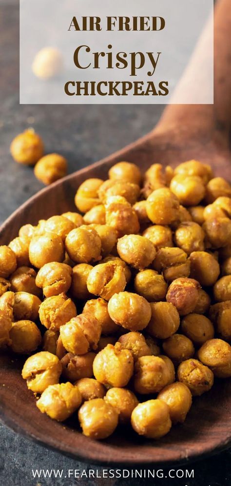 These crispy air fried chickpeas make a delicious healthy snack in just 15 minutes. You can season them any way you like. I used curry and turmeric, giving them a beautiful golden color! If you haven't tried air frying garbanzo beans, you need to because this crunchy snack is so easy to make. Crispy Garbanzo Beans Air Fryer, Air Fryer Garbanzo Bean Recipes, Air Fry Beans, Air Fry Garbanzo Beans, Air Fried Garbanzo Beans, Air Fried Beans, Air Fryer Garbanzo Beans, Fried Garbanzo Beans, Crispy Garbanzo Beans