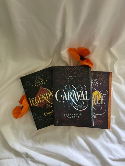 The Caraval Series books laid down against white with orange flowers. Carnaval Book, Carnival Book, Viral Books, 40 Book Challenge, Books For Teenagers, Caraval Trilogy, Greek Mythology Books, Arabic Interior Design, Caraval Series