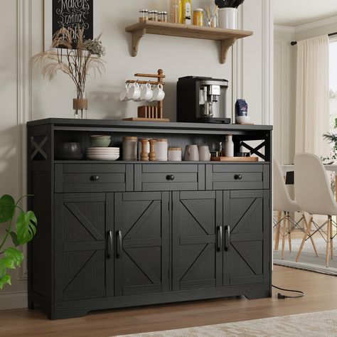 PRICES MAY VARY. STYLISH FARMHOUSE CABINET: Features with antique wooden finish, barn doors and metal crossbar decoration, this farmhouse buffet storage cabinet will add a touch of vintage elegance to your home decor. It will make your home a charming place to stay AMPLE STORAGE SPACE: Not Enough Storage Space in the home? Get tired of a cluttered room? This Large sideboard buffet cabinet is designed with 1 open shelf, 4 doors, and 3 drawers, which offers ample storage space for different sizes of daily essentials to be organized and easily accessible FUNCTIONAL ACCENT CABINET: With a diverse design and ample storage space, this wooden storage cabinet can be used as a kitchen pantry, a coffee bar station, a hutch cupboard, a wine cabinet, or even a home office cabinet to organize your stuf Black Buffet Sideboard, Kitchen Storage Pantry, Farmhouse Kitchen Storage, Coffee Cabinet, Wood Cupboard, Black Buffet, Sleek Cabinet, Farmhouse Buffet, Cabinet With Shelves