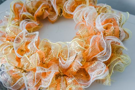 This ruffle deco mesh wreath reminds me of candy corn and I love it! Fall Wreath Dollar Tree, Diy Deco Mesh Wreath, Spring Deco Mesh Wreaths, Deco Mesh Crafts, Making Mesh Wreaths, Easter Mesh Wreaths, Burlap Wreath Tutorial, Diy Ruffle, Fall Mesh Wreaths