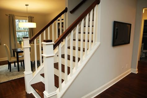 Took out half wall on this staircase of 1950's cape cod. Wall behind was actually a solid wall with a door. We turned it into a dining room and opened it up. Loved this feature! #baystreetbungalows #houseflip #remodel Open Stairs, Traditional Staircase, Stairs In Living Room, Staircase Remodel, Staircase Makeover, Stair Remodel, Attic Remodel, Cape Cod House, Interior Stairs