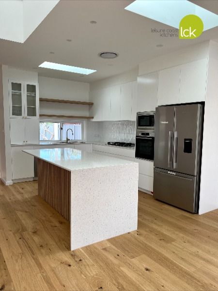 A beautiful, newly renovated kitchen with fresh and modern finishes and features customised to suit our customer 🤍🌟 . . @polytec Steccawood Square profile in Natural Oak and flat panel Polar White @caesarstoneau Nougat #customkitchen #qualitykitchen #customkitchendesign #illawarrajoinery #customjoinery #functionalkitchen #leisurecoastkitchens #stylishkitchen #kitcheninspo #kitchendesigninspo #customkitchen #whitekitchen #steccawood #polytec #polarwhite #naturaloak #caesarstone #nougat Polytec Steccawood, Renovated Kitchen, Custom Kitchens Design, Joinery Design, White Modern Kitchen, Bespoke Kitchens, Functional Kitchen, Stylish Kitchen, Custom Kitchen