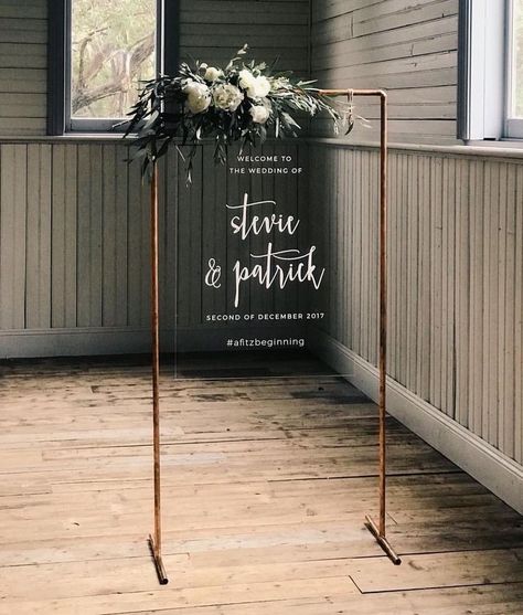 Copper stand with acrylic sign and flowers for wedding. Diy Sign Stand, Ceremony Signage, Event Signs, Rustic Wedding Decorations, Copper Wedding, Reception Signs, Sign Stand, Maine Wedding, Brunch Wedding