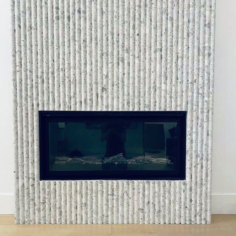 Ann Sacks Vancouver’s Instagram post: “Loving this fireplace with our Terrazzo Renata Fluted 😍. Isn’t it so sexy🔥? #interiordesign by @jjinteriors #installation @keystonetile…” Terrazzo Fireplace Surround, Fluted Marble Fireplace, Fluted Fireplace Surround, Terrazzo Fireplace, Aspen Cabin, Mid Century Fireplace, Terrazzo Marble, Saskatchewan Canada, Ann Sacks