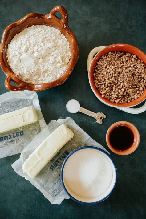 Discover the joy of baking Polvorones, the classic Mexican cookies! Perfect for any occasion, these buttery, crumbly treats blend pecans, sugar, and a hint of cinnamon. Easy to make, they're dusted with powdered sugar for a sweet finish. Ideal for sharing with loved ones or enjoying with a cup of coffee, these homemade delights will bring a taste of Mexico to your kitchen. Experience the simple pleasure of creating and savoring these Tex-Mex inspired Mexican Wedding Cookies! Mexican Cookies, Joy Of Baking, Mexican Wedding Cookies, Mexican Wedding, Wedding Cookies, Mexican Food Recipes Authentic, Italian Pasta, Confectioners Sugar, Tex Mex