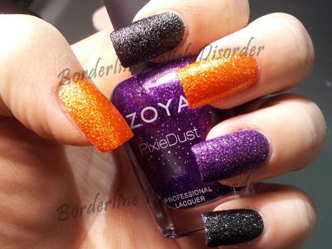 Zoya Dhara (orange), Dahlia (black) and Carter (purple, bottle). Halloween 2013 manicure. Purple And Orange Halloween Nails Acrylic, Matte Black And Orange Halloween Nails, Purple Orange And Black Nails, Purple Orange Nails Halloween, Purple Green Orange Nails, Black And Orange Ombre Nails Halloween, Orange Glitter Halloween Nails, Orange Purple Halloween Nails, Black Purple And Orange Nails