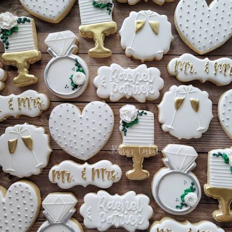 Kassy's Cookies on Instagram: "I interrupt your Halloween feed with these simple yet classy cookies for Rachel & Patrick 🥂🥂 . . . . #bride #bridetobe #mrandmrs #brideandgroom #wedding #married #love #congratulations #cookies #sugarcookies #decoratedsugarcookies #customcookies #decoratedcookies #cookielove #cookieart #royalicing #cookiecutters #cookier #ohiocookier #cookiesofinstagram #sweets #bake #edibleart #cookie #cleveland #ohio #neohio #lodiohio #kassyscookies" Decorated Bridal Shower Cookies, I Do Crew Cookies, Wedding Shower Cookies Decorated Simple, Royal Icing Engagement Cookies, Easy Wedding Cookies Royal Icing, Wedding Shower Cookies Royal Icing, Engagement Cookies Ideas Simple, Cookies For Engagement Party, Married Cookies