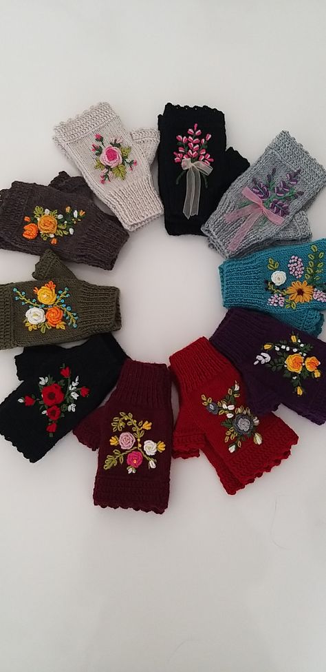 Each glove has a flower design on it. The natural fiber of the yarn keeps these wrist warmers soft and warm.
Knitted from wool yarn, these gloves are very warm and stylish.
Vivid colors with floral embroidery make these gloves unique.

It will make you look more stylish😊 Perfect gift for your lover, lover and yourself. We know you will love our gloves.
My small embroidered fingerless knit gloves will add beauty to you. Embroidered Gloves, Autumn Accessories, Half Gloves, Crochet Bracelet Pattern, Ladies Gloves, Bracelet Crochet, Gloves Pattern, Crochet Fingerless Gloves, Hand Gloves