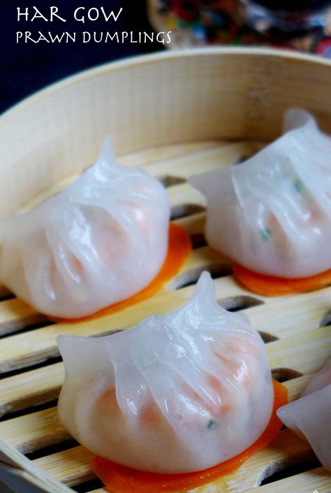 A close up shot of Har Gow in a steamer basket. You can see the pink, cooked prawns inside the translucent wrapper. Crystal Shrimp, Dumplings Recipe Chinese, Har Gow, Dumpling Recipes, Prawn Dumplings, Dim Sum Dumplings, Chinese Dumpling, Translucent Skin, Dim Sum Recipes