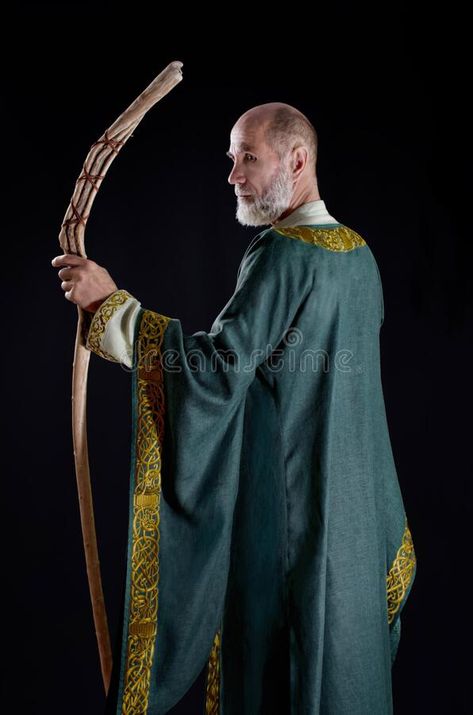 Powerful Wizard Holds A Wooden Magic Staff Stock Photo - Image of cloak, magician: 201018798 Wizard Casting Spell Pose, Magic Staff Pose, Wizard Holding Staff, Person Holding Staff Reference, Wizard Poses Reference Male, Man Holding Staff, Person Holding Staff, Villain Animation, Holding Staff Pose